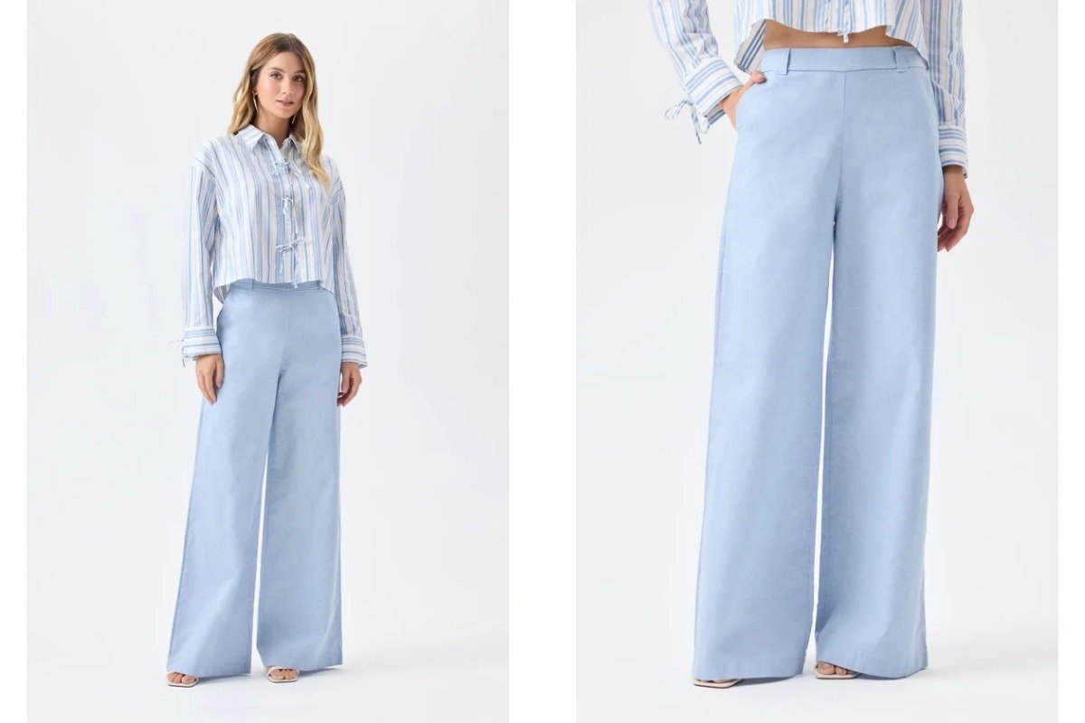 mulher vestindo uma blusa com listras e uma calca de alfaiataria