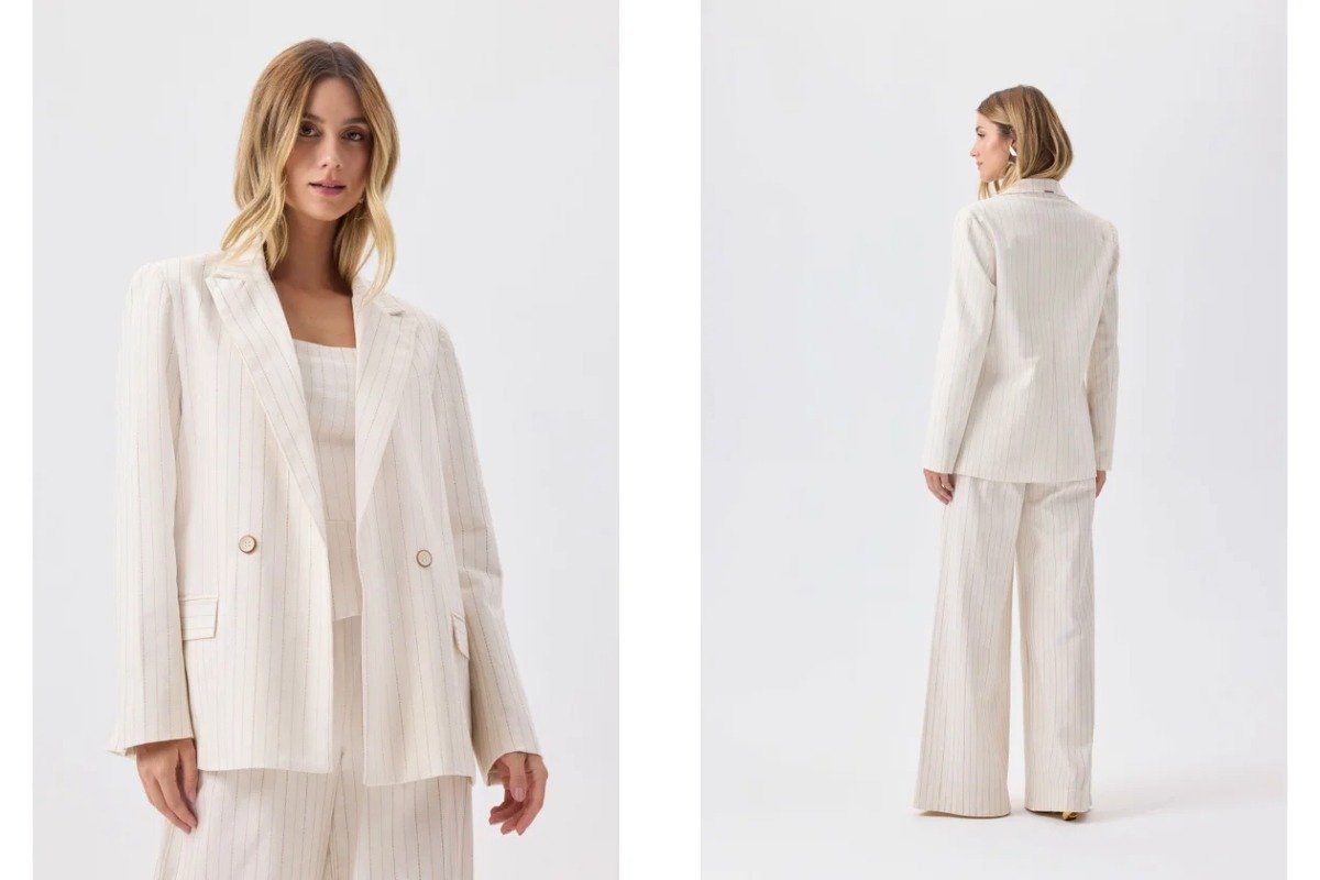 mulher usando conjunto de calca e blazer de alfaiataria