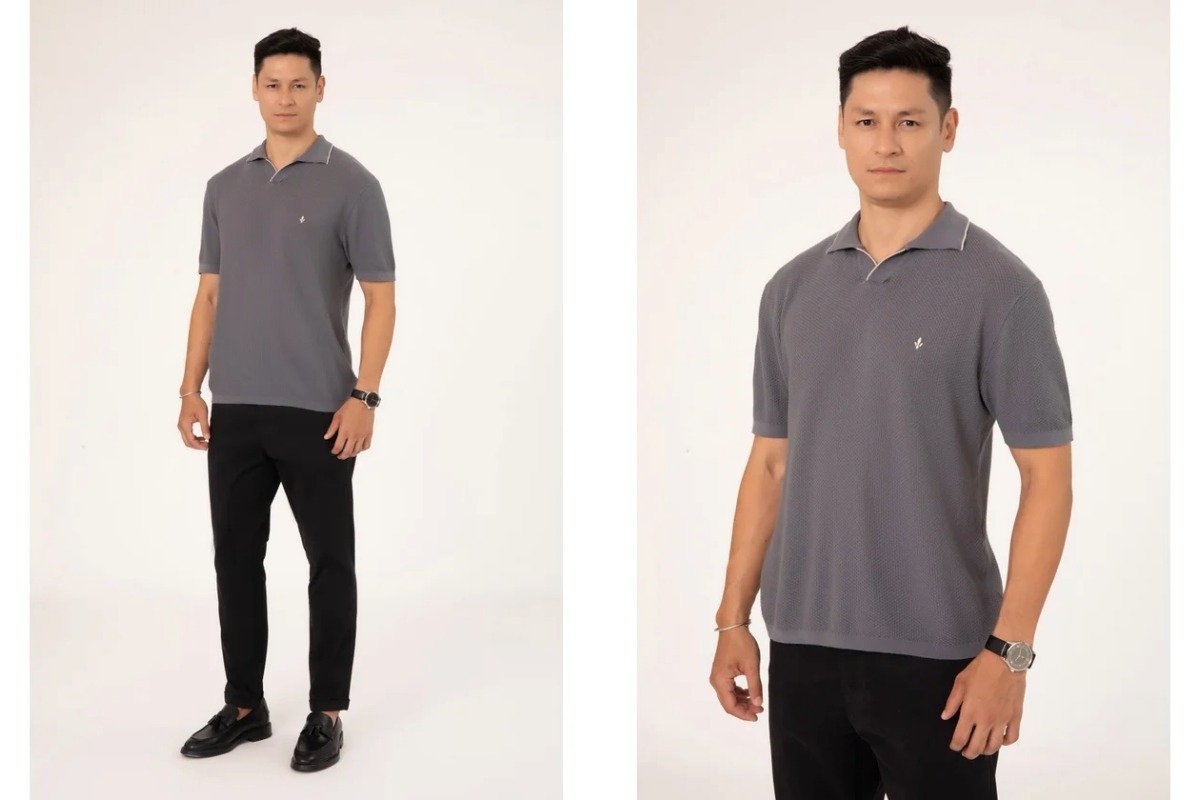 homem usando camisa polo cinza