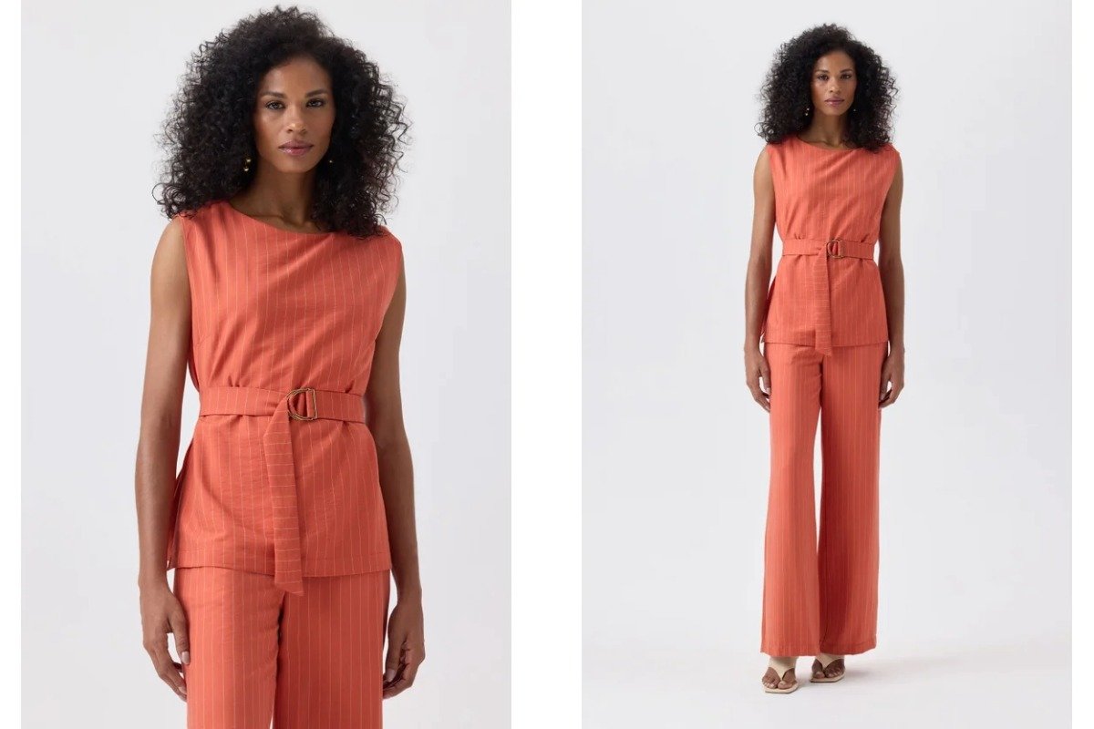 mulher usando conjunto de alfaiataria na cor salmao