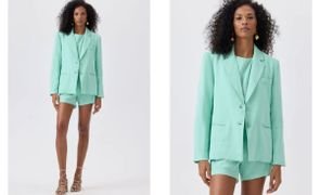 mulher negra com conjunto verde agua