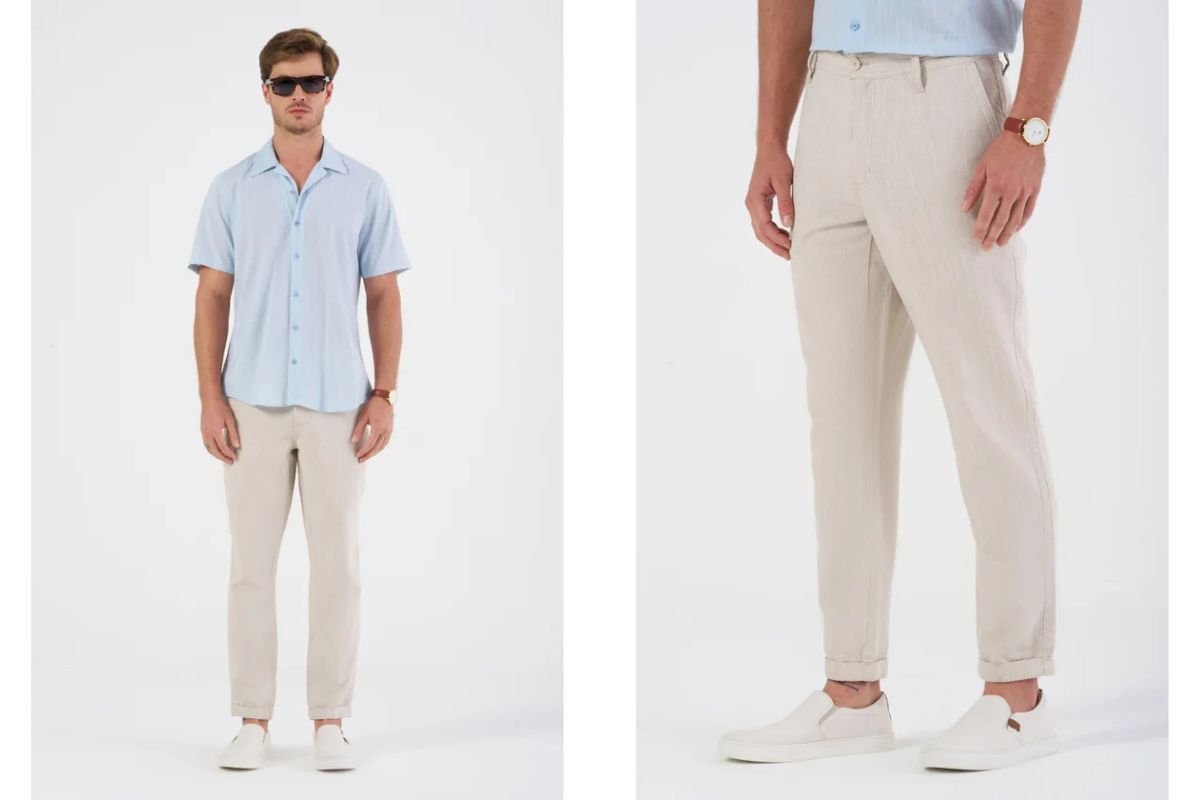homem usando calca chino bege e camisa azul claro