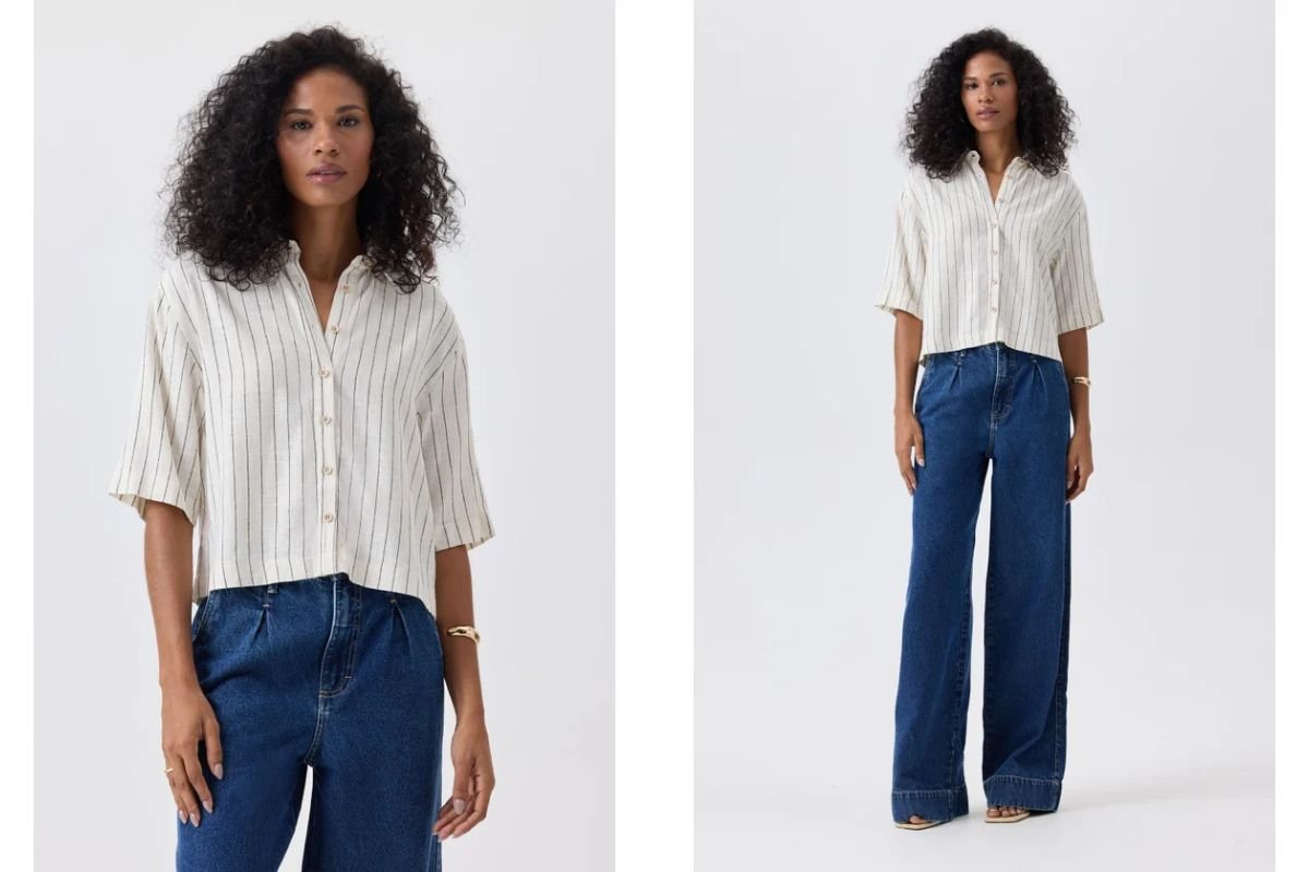 mulher morena com camisa de linho e calca jeans