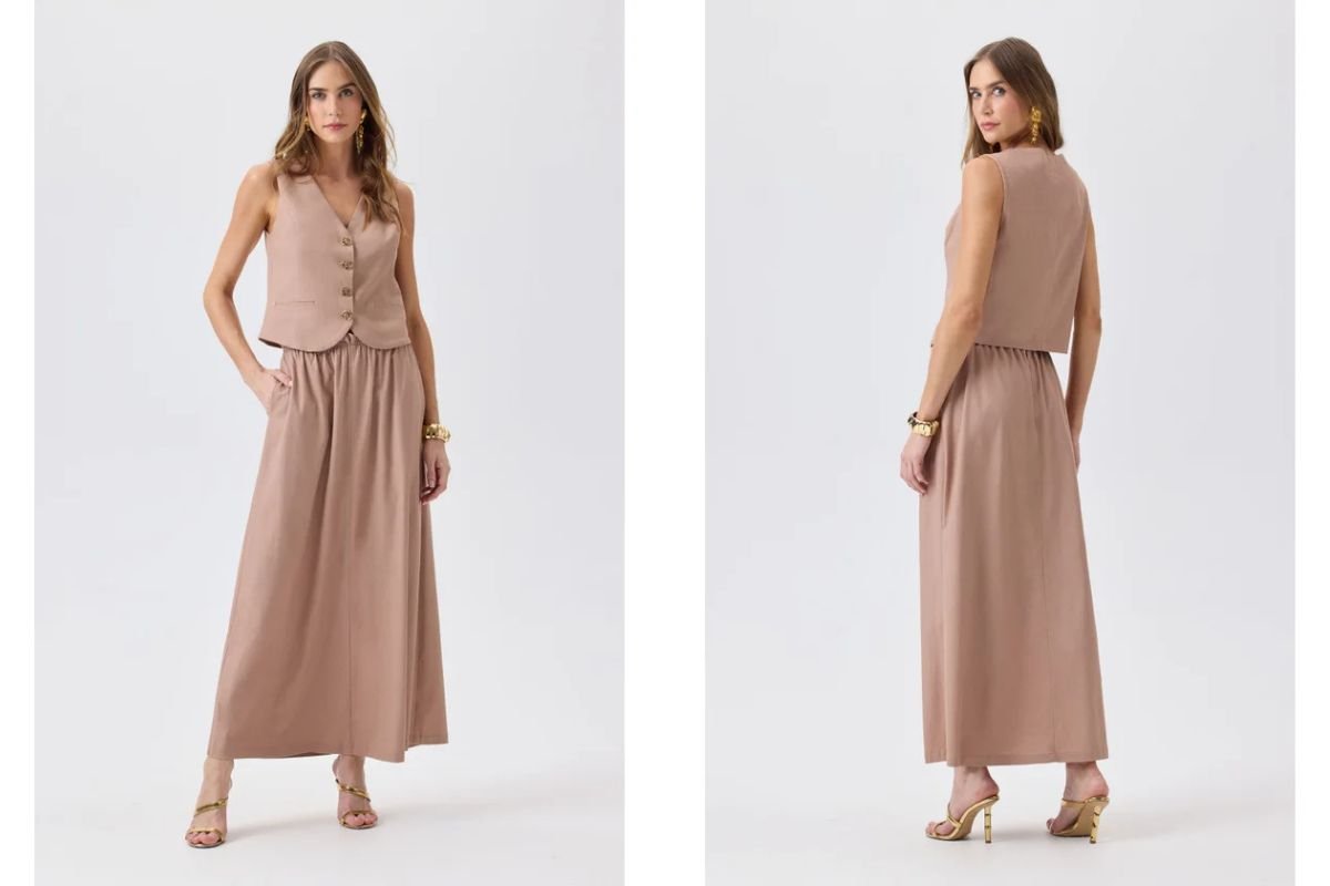 mulher loira com saia de linho e blusa