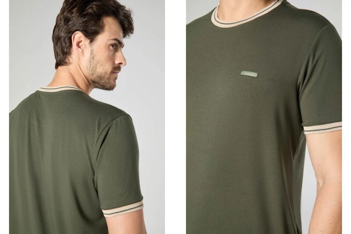 modelo mostrando detalhes na camiseta verde